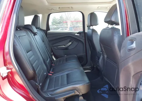 2017 Ford Escape Titanium z USA, uszkodzony, nr VIN 1FMCU9J96HUA68094